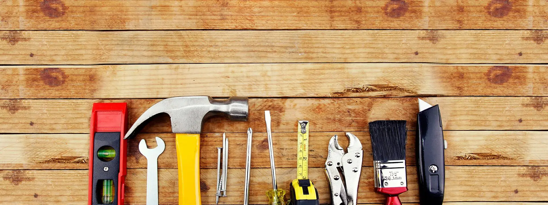 Hardware tools placed on the wooden table